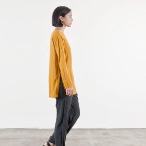 Black Crane mustard yellow slit top